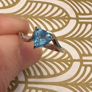 Blue Topaz stone set in 925 sterling silver ring size 5 1/2.  So Beautiful